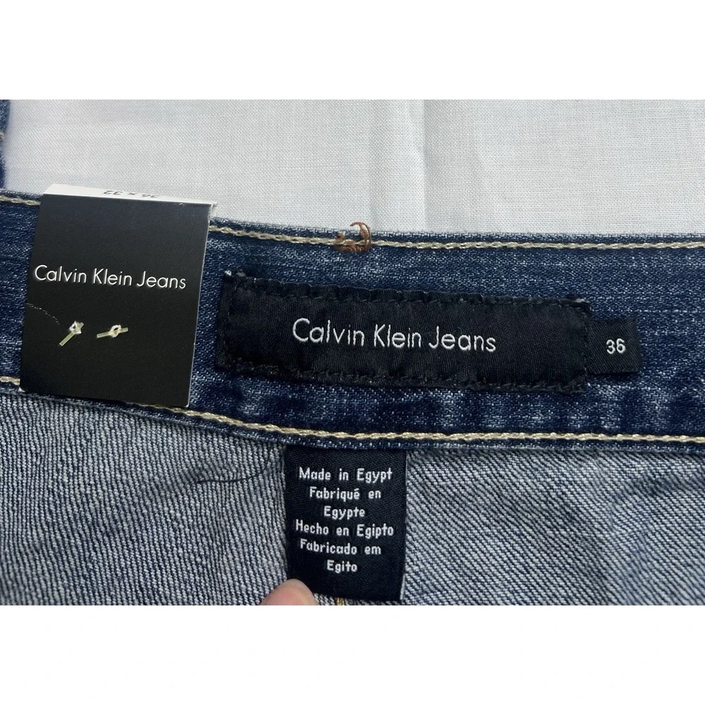 Calvin Klein Men's Jeans 36x32‎ Easy Fit Tapered leg Medium Wash Cotton